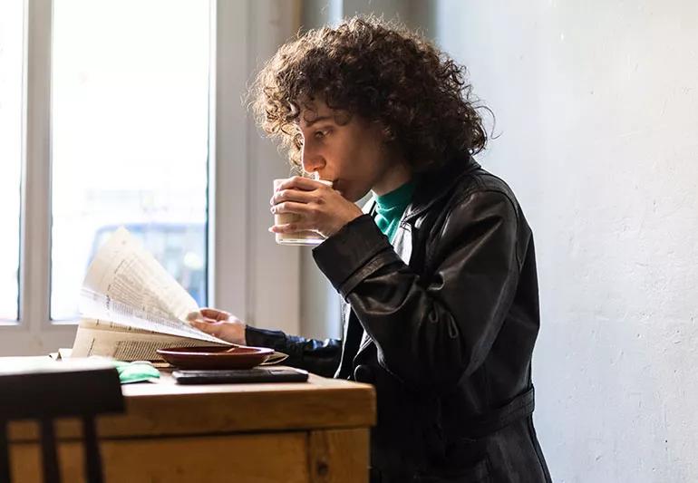 nonBinary Person drinking Coffee 1315440433 770x533 kc jpg