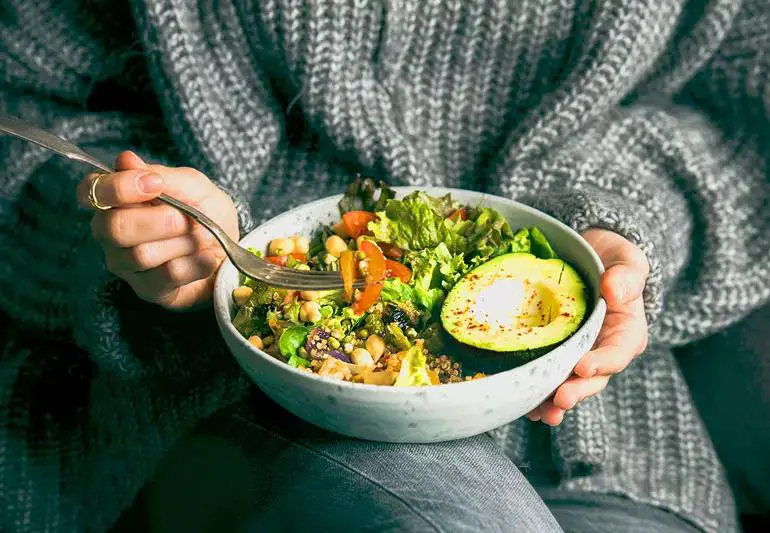 woman eating Healthy Salad 1130791021 770x533 1 jpg